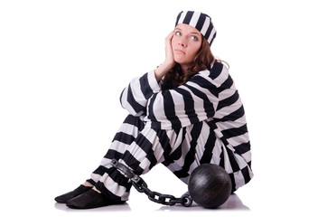 Prisoner in striped uniform on white
