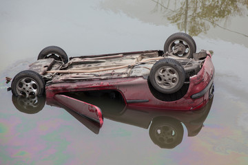 The car fell into the water and capsized