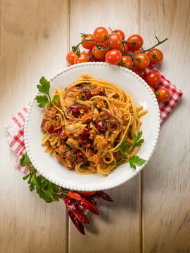 pasta with fish ragout and hot chili pepper
