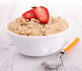 bowl of muesli and strawberry, porridge