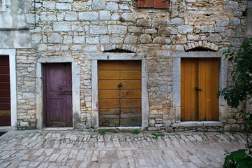 Three closed doors in the old town
