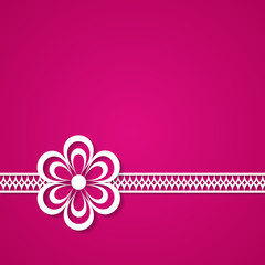 pink background with a lace and a flower
