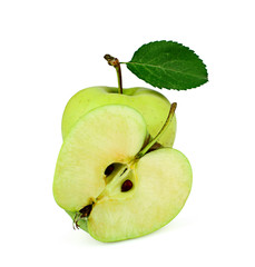 Green apple with leaf and half