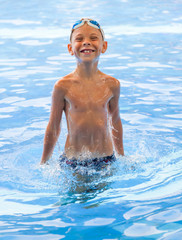 playing boy in the water