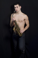 Obraz na płótnie Canvas Men with saxophone