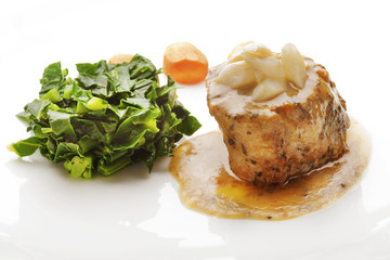 Juicy Fillet Mignon served with Sauce and Vegetables