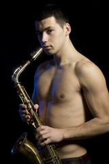 Fototapeta na wymiar Handsome men with saxophone