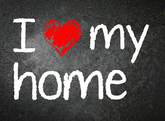 I love my home handwritten with white chalk on a blackboard.