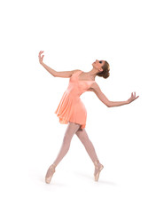 Obraz premium Young beautiful ballet dancer isolated over white background