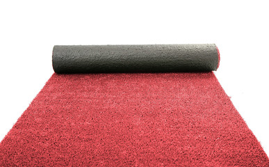Artificial rolled red grass, isolated on white