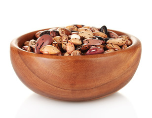 Wooden bowl with beans isolated on white