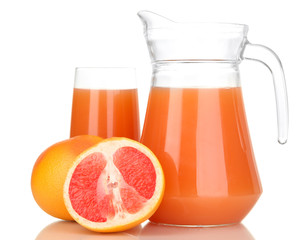 Full glass and jug of grapefruit juice and grapefruits isolated