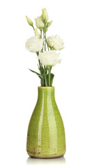 Bouquet of eustoma flowers in vase isolated on white