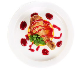 Small portion of food on big plate isolated on white