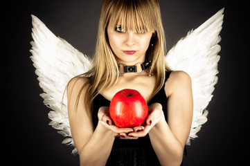 beautiful young girl in the role of tempting angel