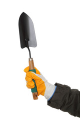 Gardening spade, shovel, trowel in hand with gloves