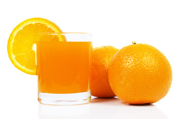 fresh orange fruits and juice isolated on white