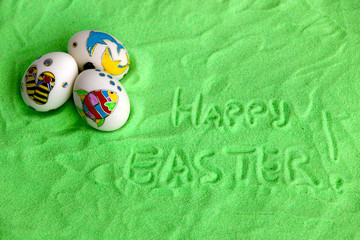 eggs green sand background