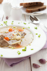 nutritious meat soup with pasta and carrots