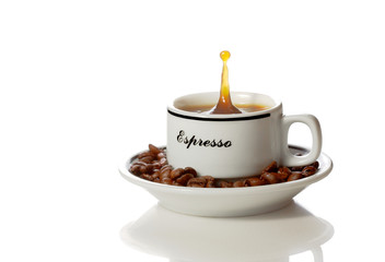 a cup of coffee with a splash
