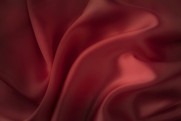 Dark red silk fabric background - soft, elegant and delicate