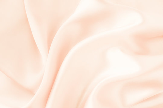 Ecru or beige silk fabric background - soft and elegant