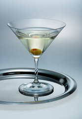 Glass of martini with olive