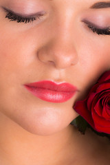 Beautiful female with romantic rose - obrazy, fototapety, plakaty