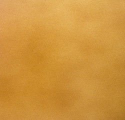 Brown surface of the wall.