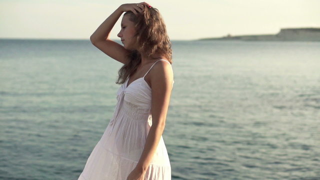 Young woman by the sea, super slow motion, shot at 240fps