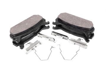 four brake pads and spring, isolatet on white