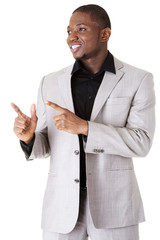 Businessman pointing on copy space