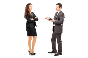 Full length portrait of a young businesspeople having a conversa