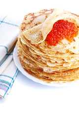 Pile of pancakes on a plate with red caviar