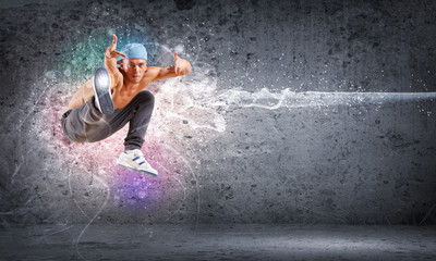 young man dancing hip hop with color lines