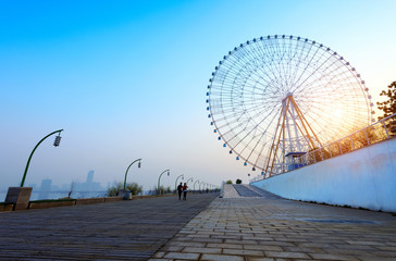People under the Ferris wheel