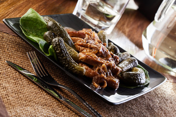 Pork loin with mushroom sauce. Dark light