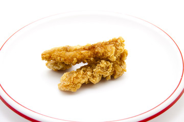Hähnchenstick auf Teller