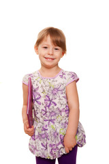 Little girl with a book. Little student. Isolated on white