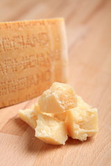 Parmesan cheese on wooden table
