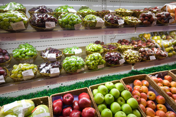 Shelf with fruits in supermarket