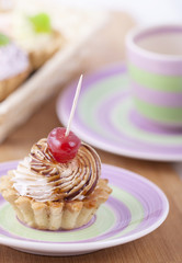 Delicious cream pastry on a plate, ready to eat