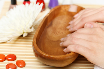 Woman is getting manicure