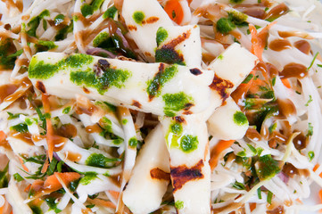 Salad with fresh vegetables with fried cheese.