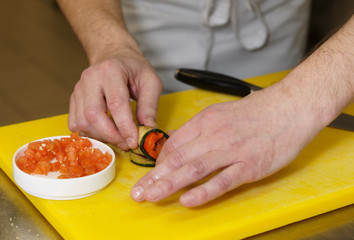 Chef is making vegetable appetizers