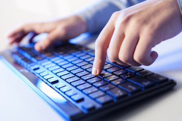 Click! Hands of a man on keyboard