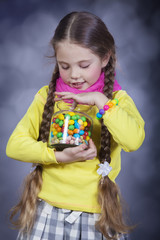 Little girl with jelly bean.