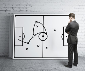 man looking tactic scheme