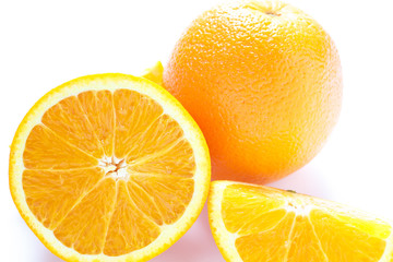 Whole and Half Orange on White