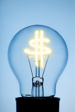 Light bulb with glowing Dollar Symbol